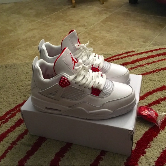 nike metallic red jordan 4